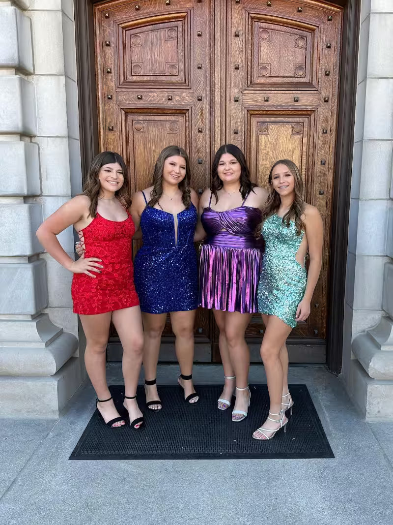 girls wearing short homecoming dresses