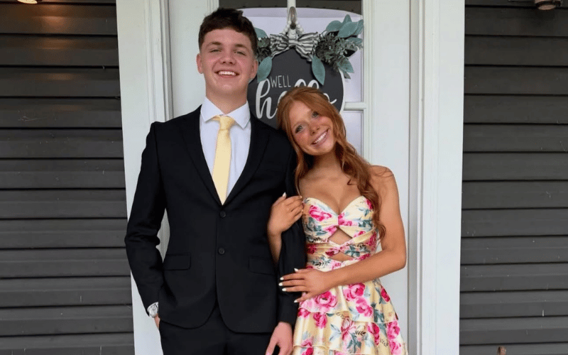 woman wearing a floral prom dress